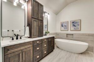 Primary bathroom remodel with double vanity and freestanding soaking tub