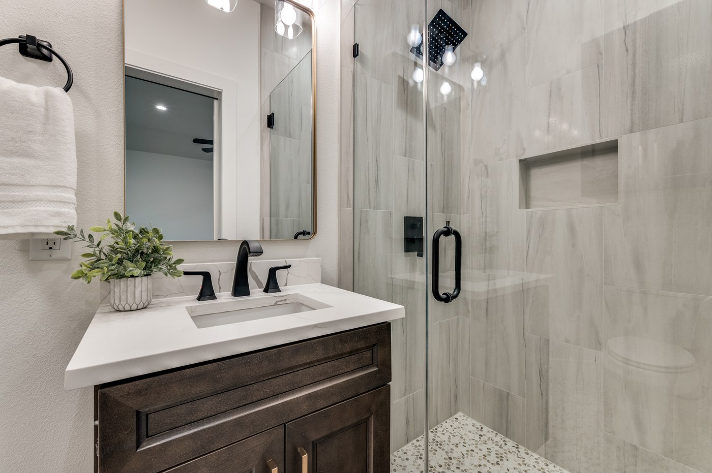 Guest bathroom remodel with updated vanity and walk-in shower in DFW