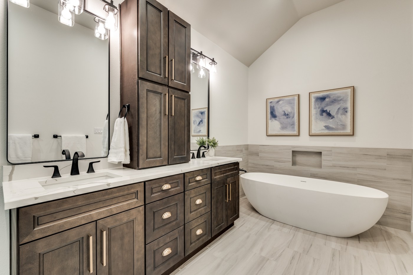 Primary bathroom with freestanding soaking tub and double vanity