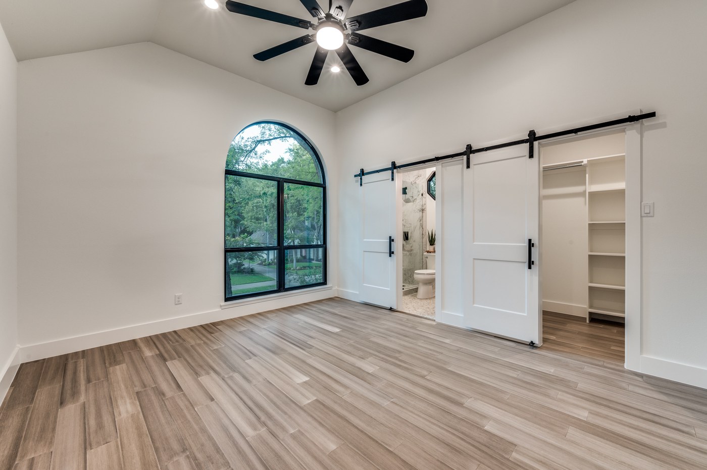 Flexible bonus room with barn door created during a home renovation