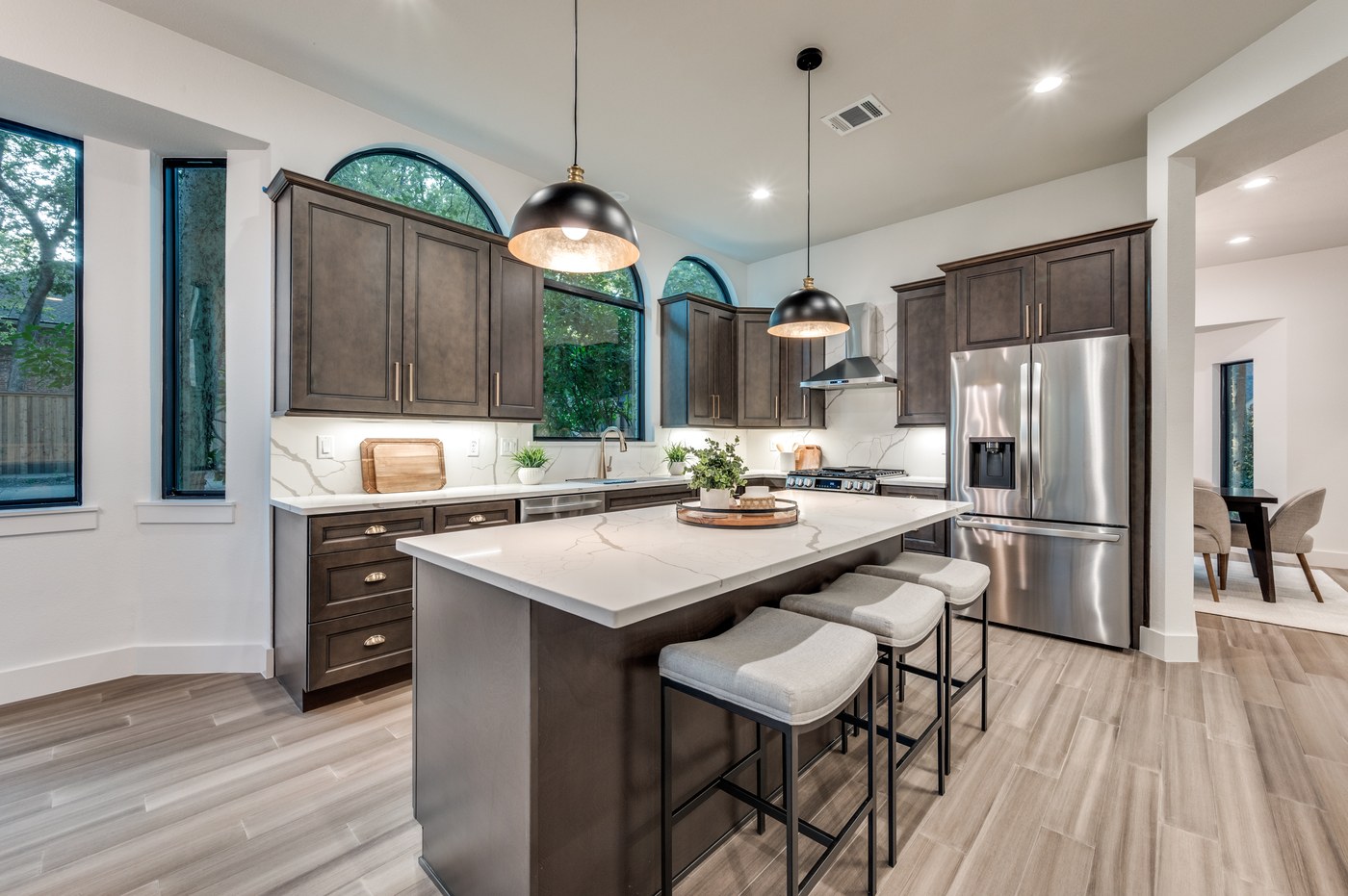 Updated kitchen with stainless appliances and custom cabinetry