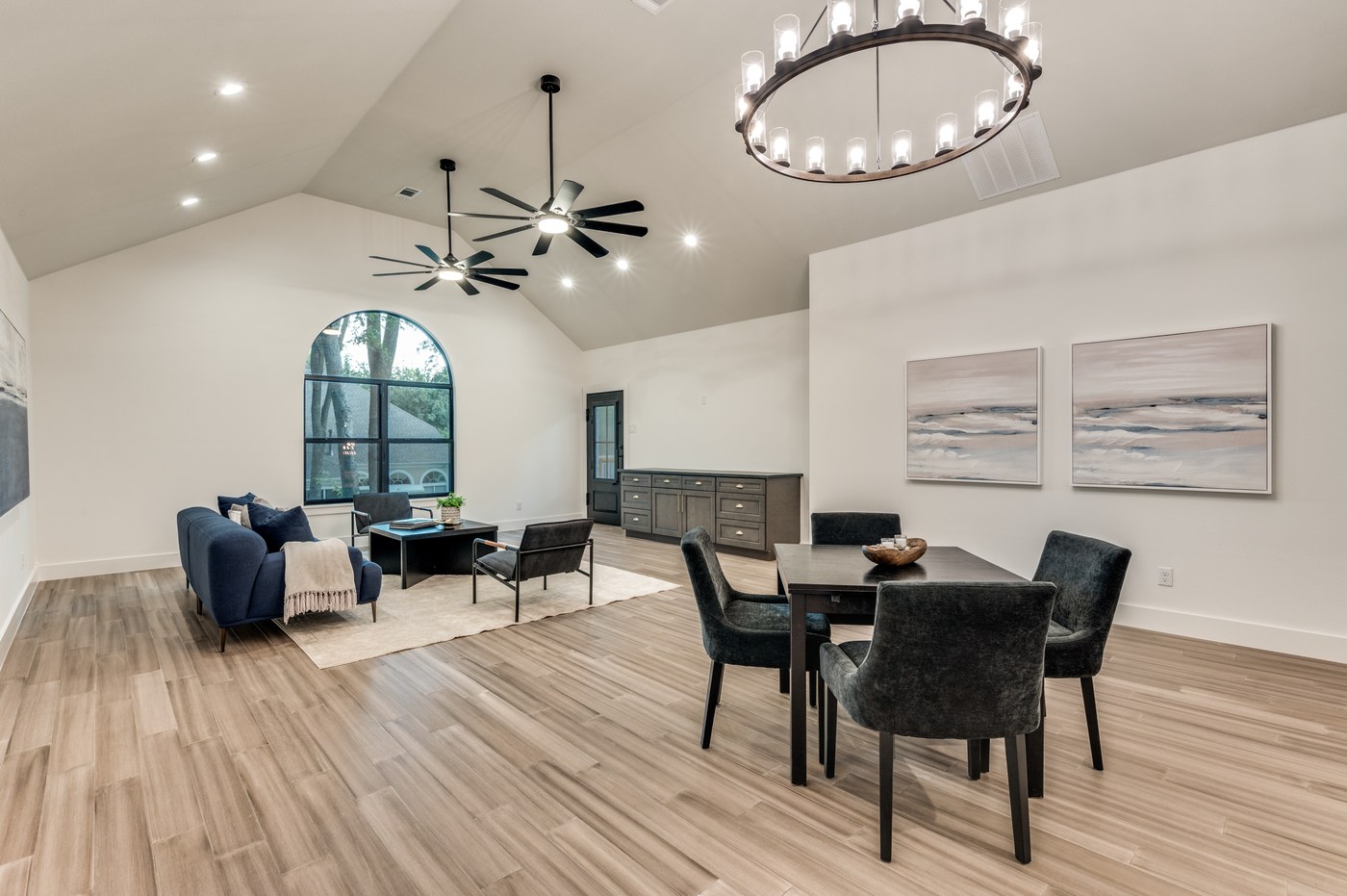 Living and dining area in an open floor plan after remodeling