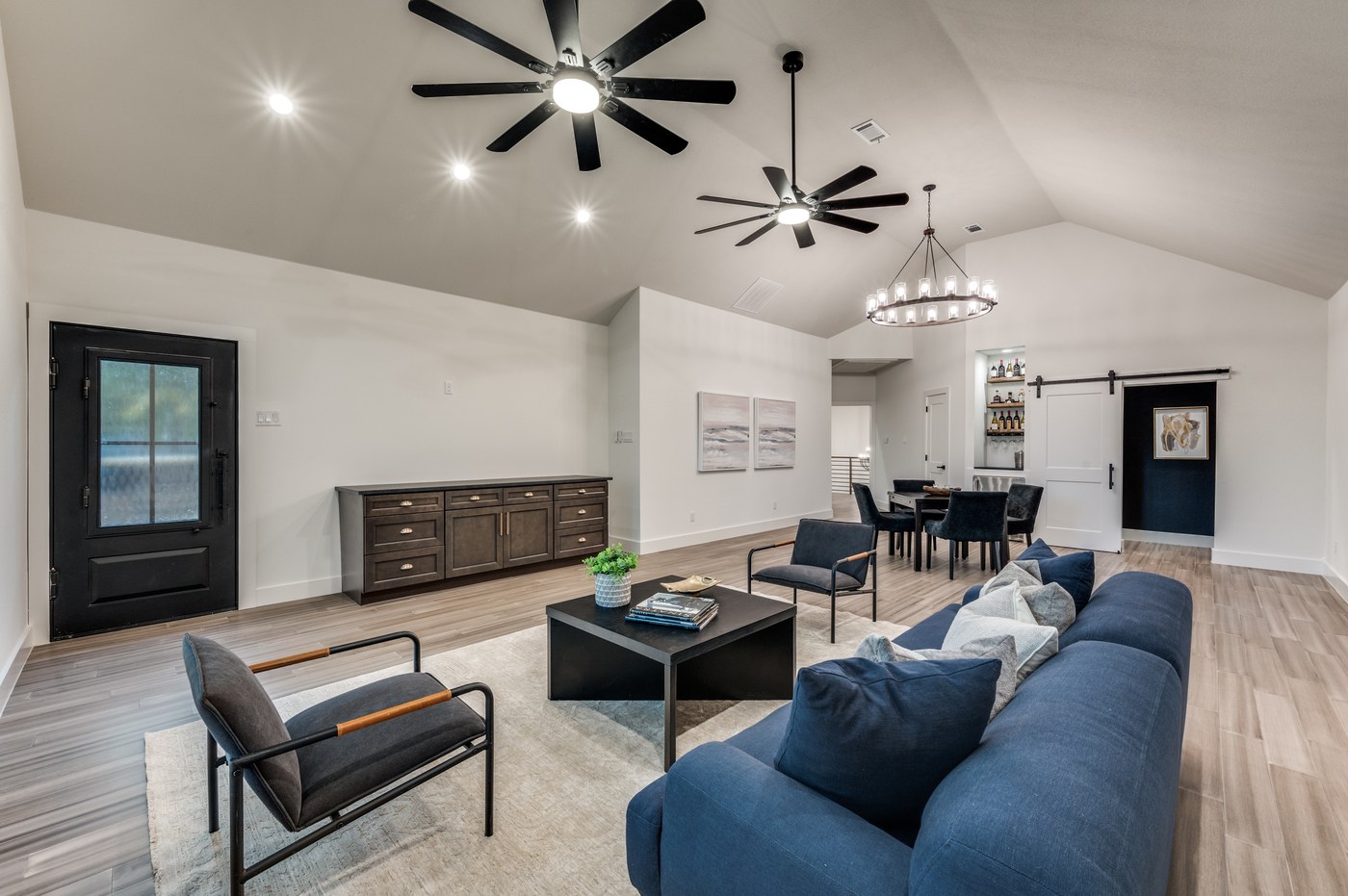 Renovated living room with natural light and updated flooring