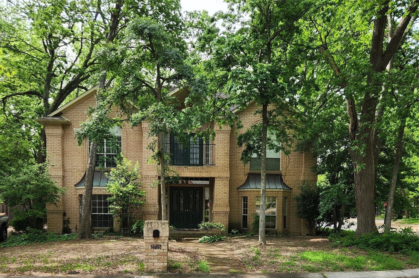 Home exterior before renovation in McKinney, TX