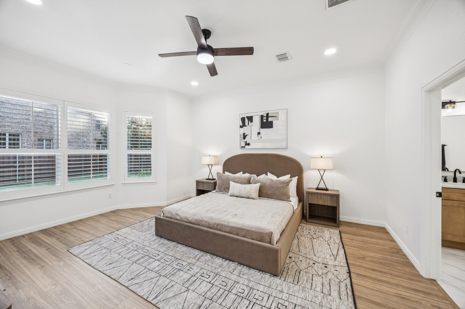 Primary bedroom after renovation by PBA Services in McKinney, TX